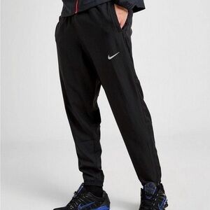 Nike Men's Black Sweatpants with White Swoosh